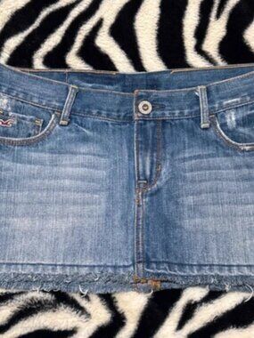 Fashionable fringed denim short skirt